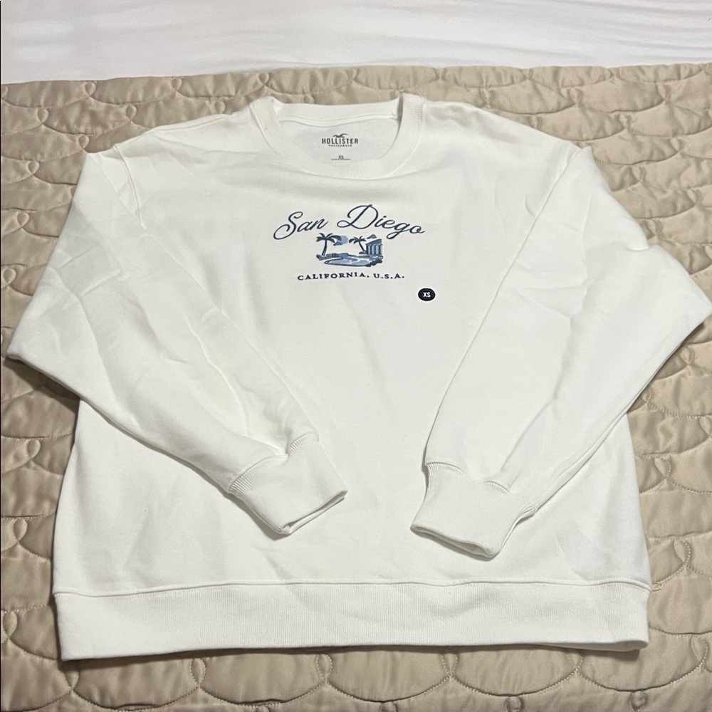 Hollister White Crewneck Sweater for Women. Never been worn.